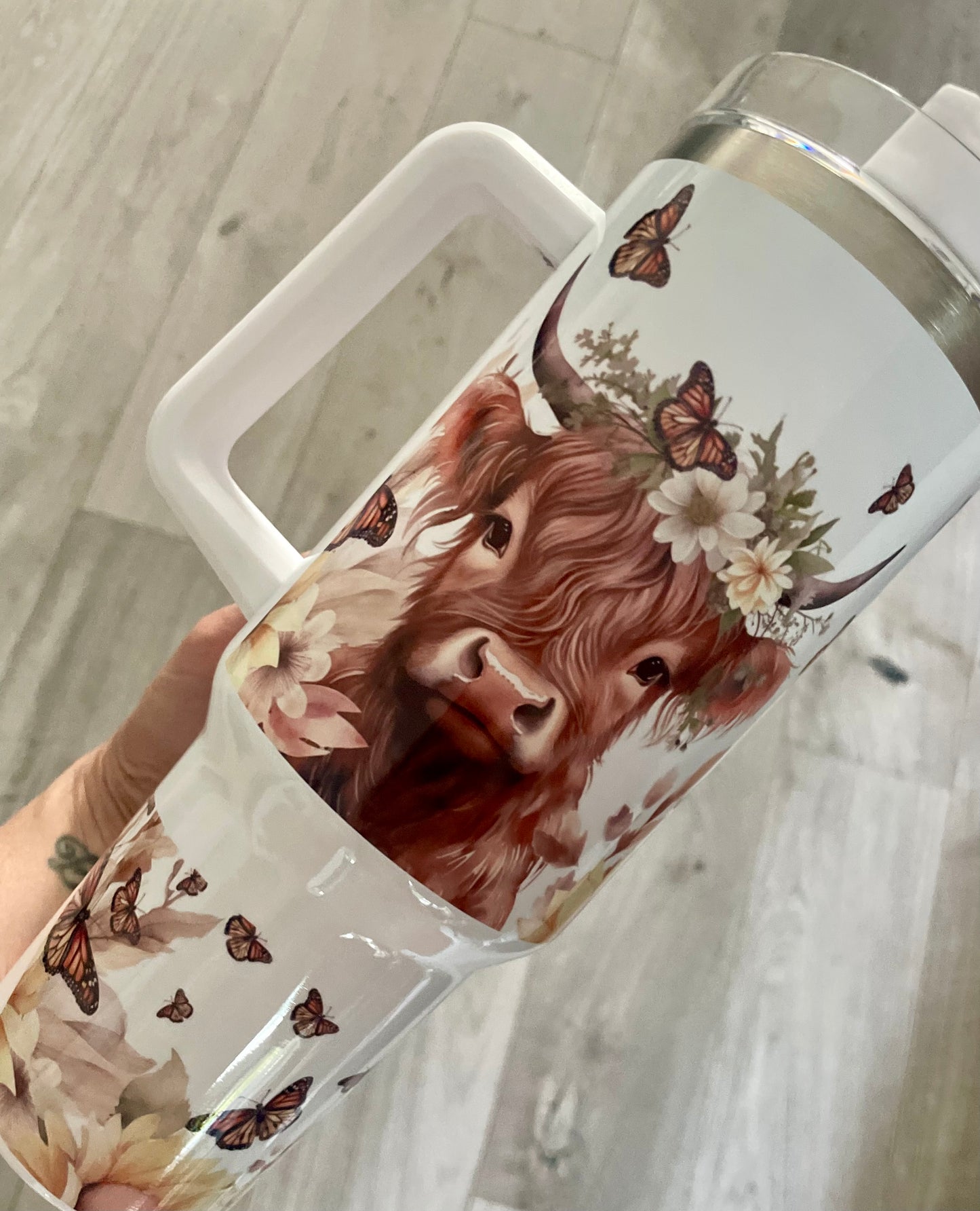 40oz Highland cow tumbler with lid and straw.