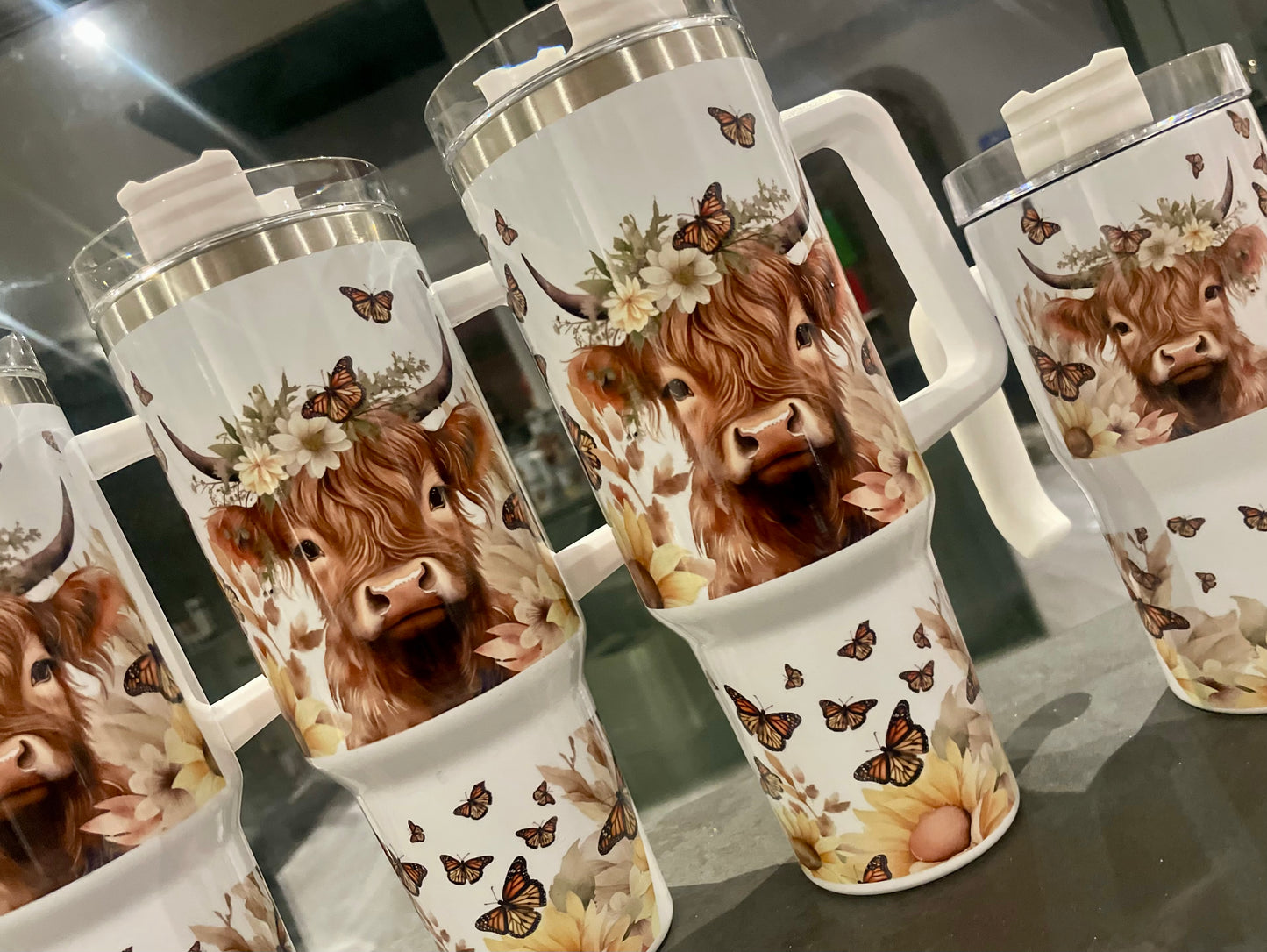 40oz Highland cow tumbler with lid and straw.